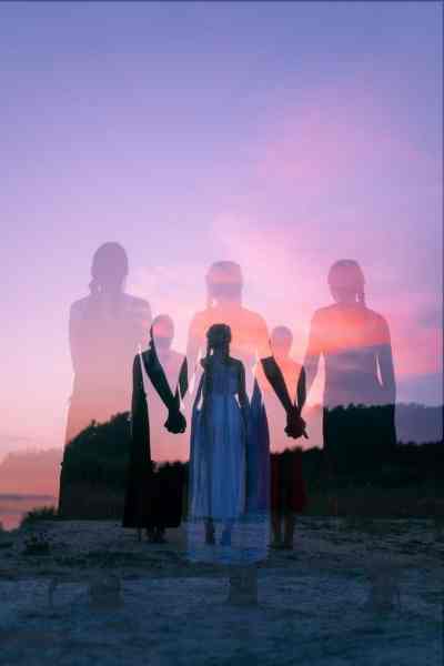 group of people standing on beach