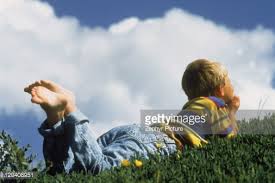 children looking up at clouds