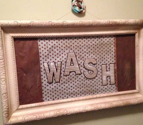 wash sign in bathroom