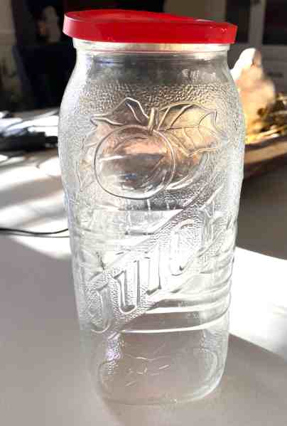 old glass juice container/great garage sale finds