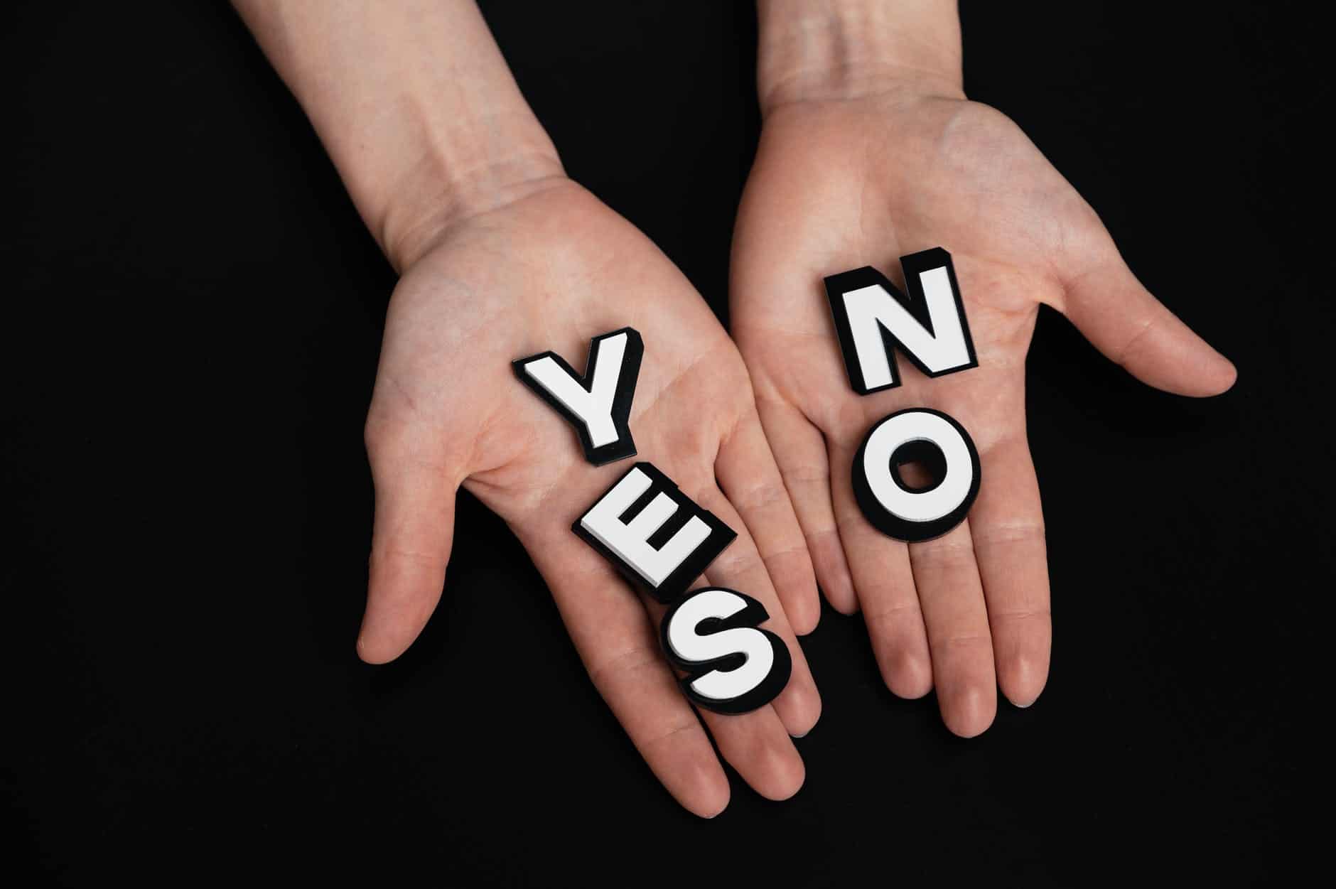 person with letters on his palms/making choices