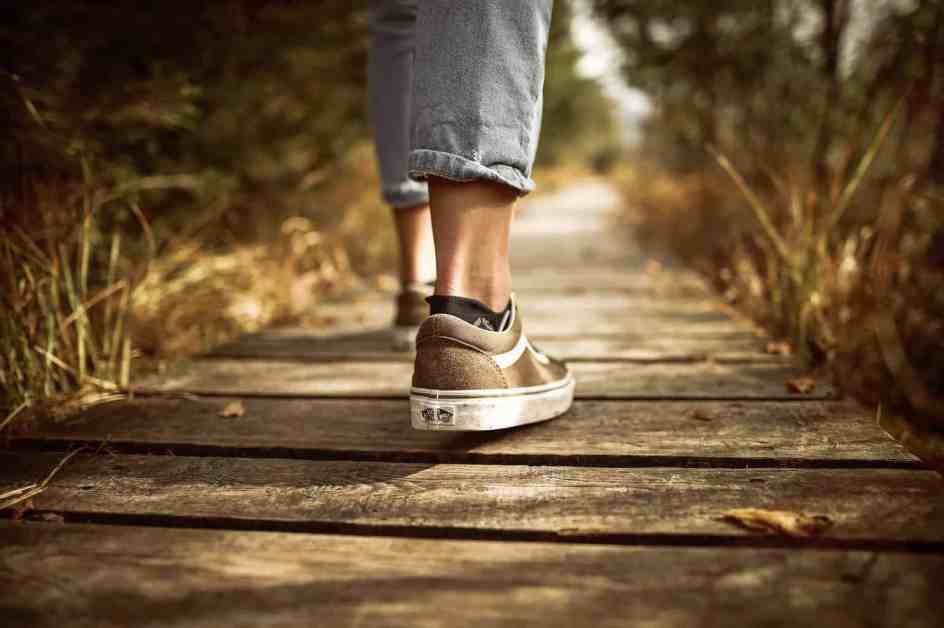 pexels-photo-631986 | goodthoughtsgoodlives person stands on brown pathway