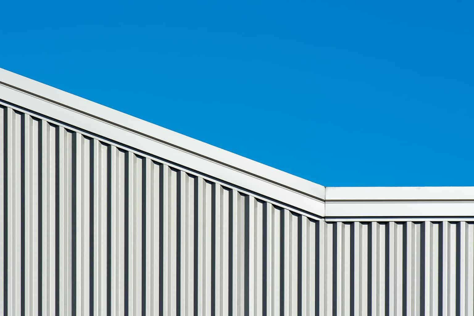 fences under clear blue sky/hard boundaries