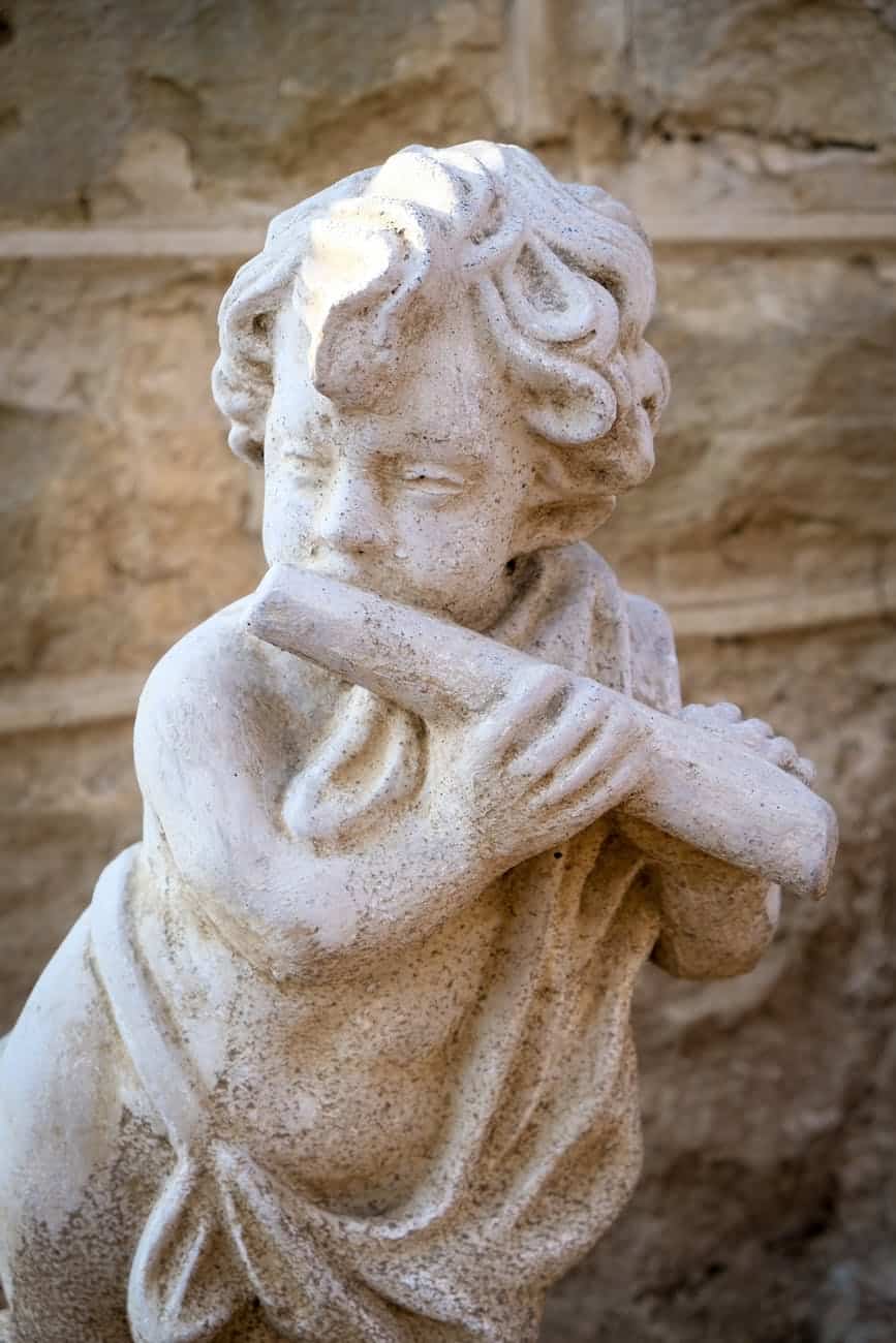 white cherub statue/dreams