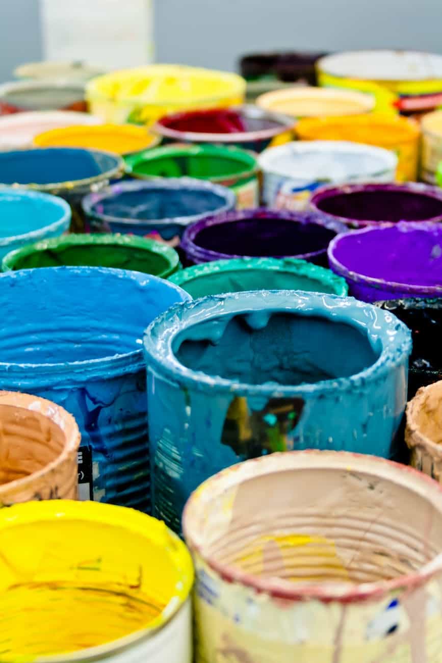 assorted color paint buckets/personal space
