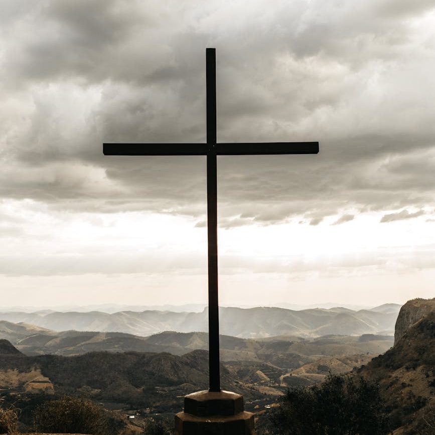 black cross on top of mountain/decisions