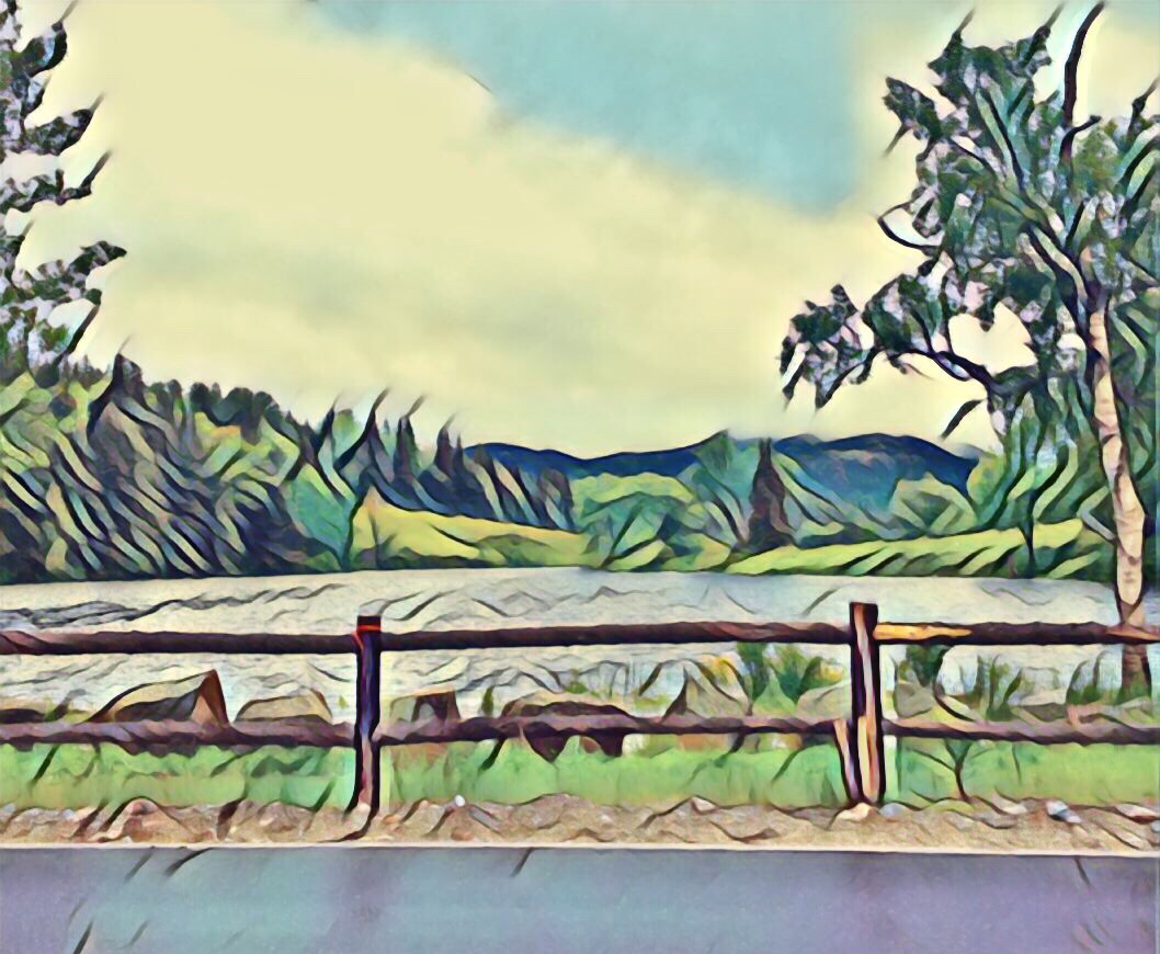 An artistic rendering of a scenic landscape with stylized trees on either side, overlooking a hilly terrain across a body of water, with a wooden fence in the foreground.