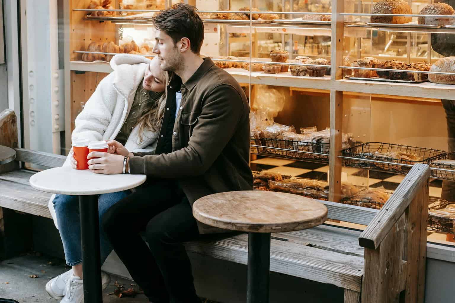young couple having rest in small cafeteria/fear
