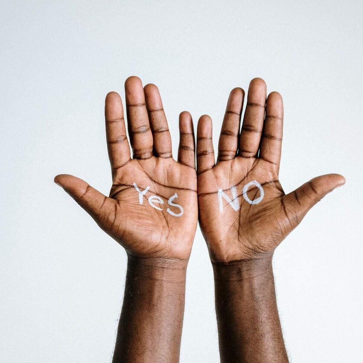 photo of person s hand with words yes or no/rescue