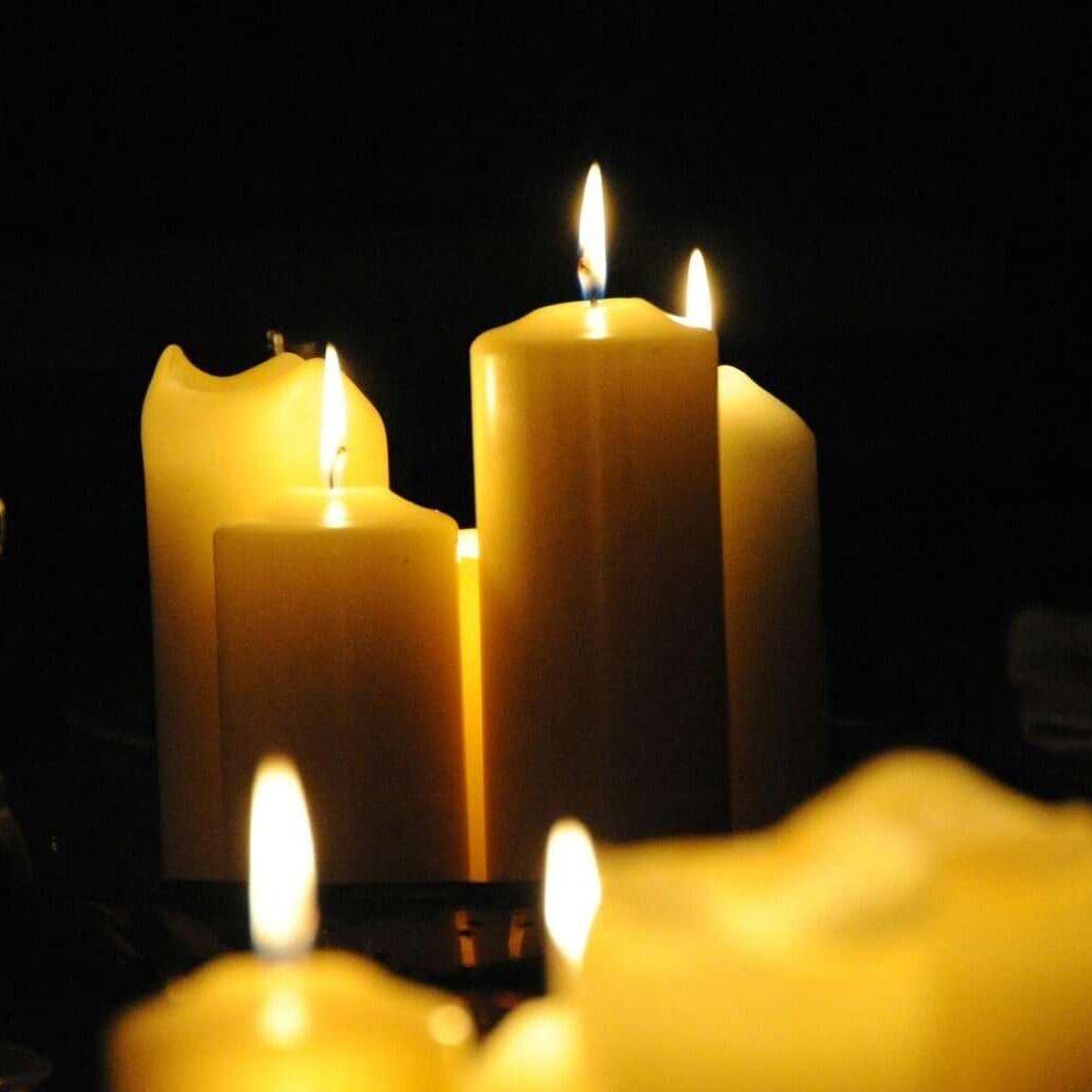 pexels-photo-8617327 | goodthoughtsgoodlives yellow candles on black surface