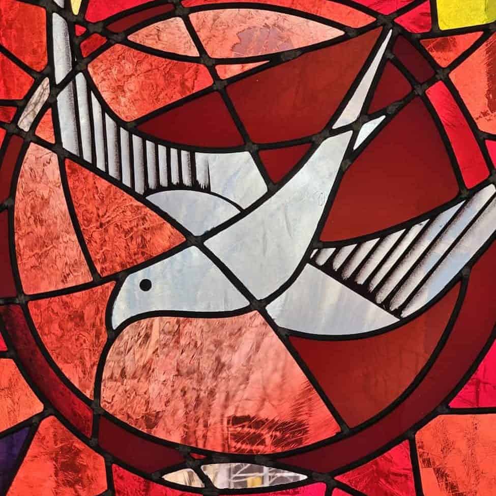 stained glass art with dove motif/hearing the Spirit's voice