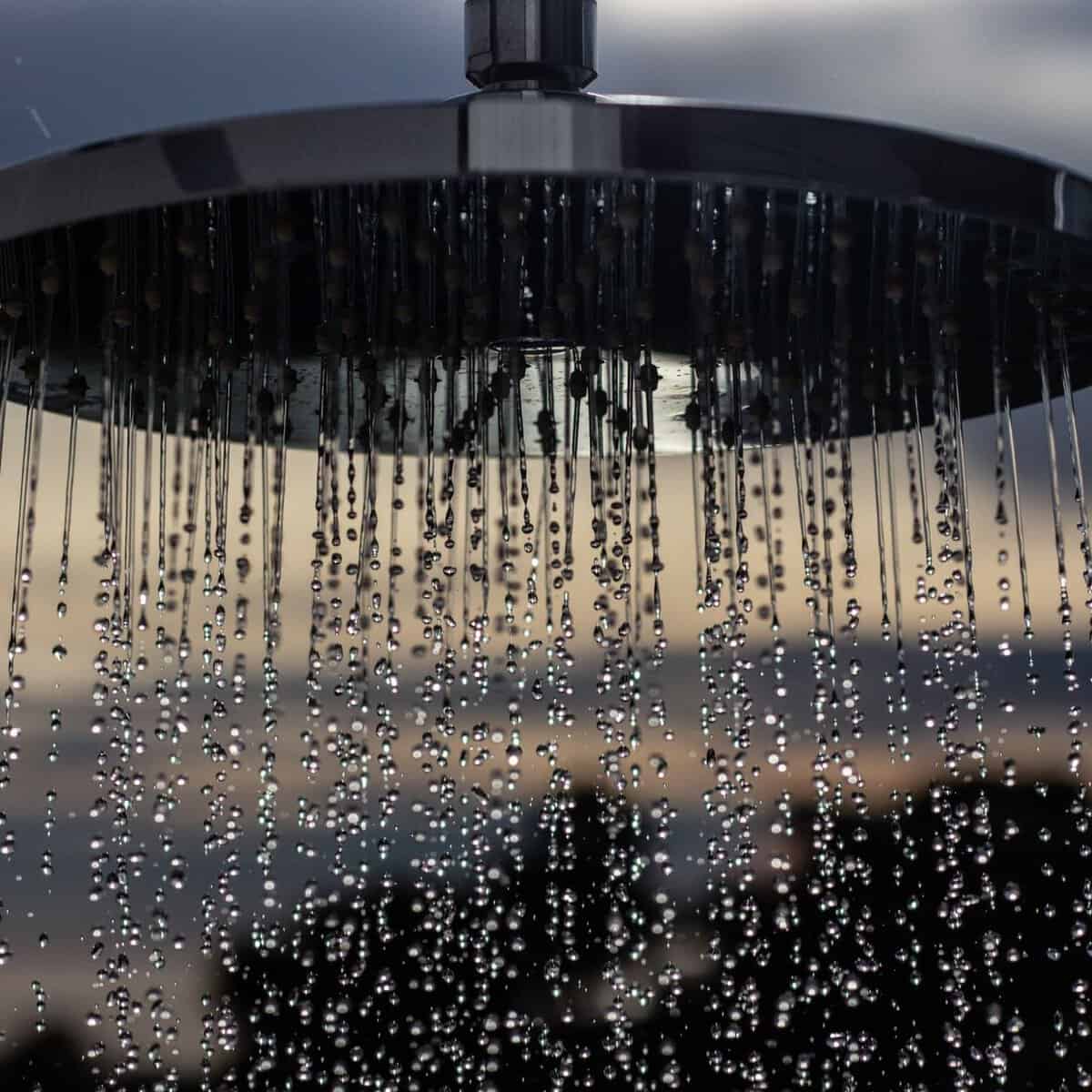 close up shot of a shower head/blessings